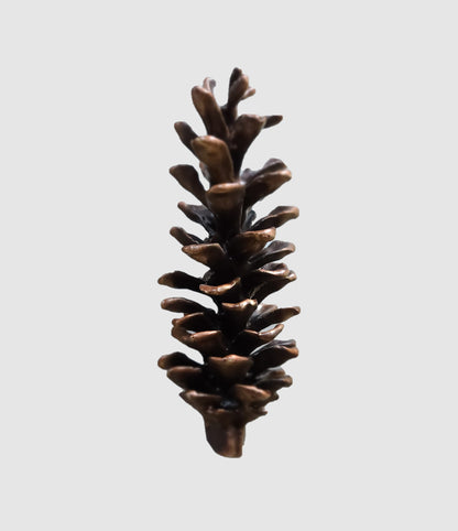 White pine cone bronze door knocker